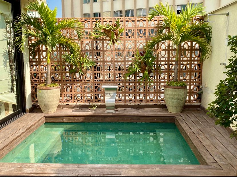 apartamento garden decorado com ombrelone