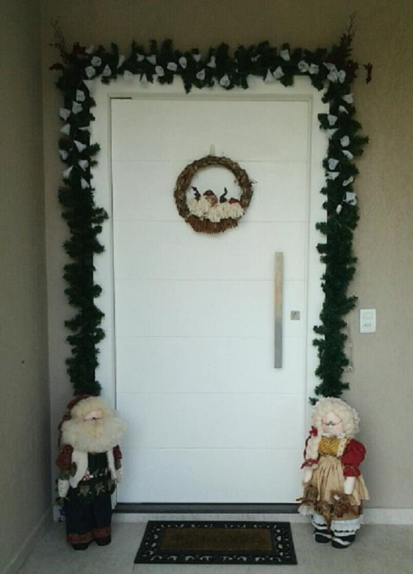 decoração de natal para porta de apartamento com luzes