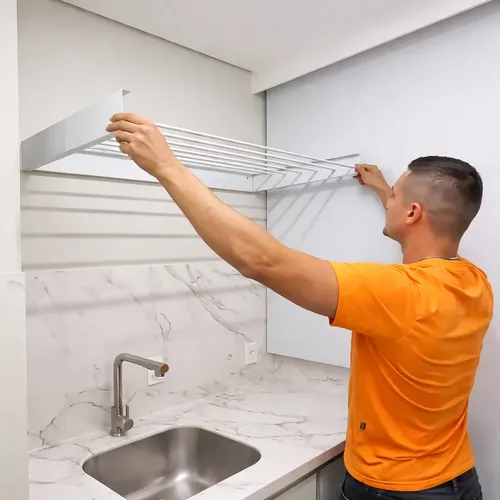 Varal de parede com cordas extensíveis